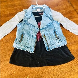 Long sleeved shirt with a denim jacket.